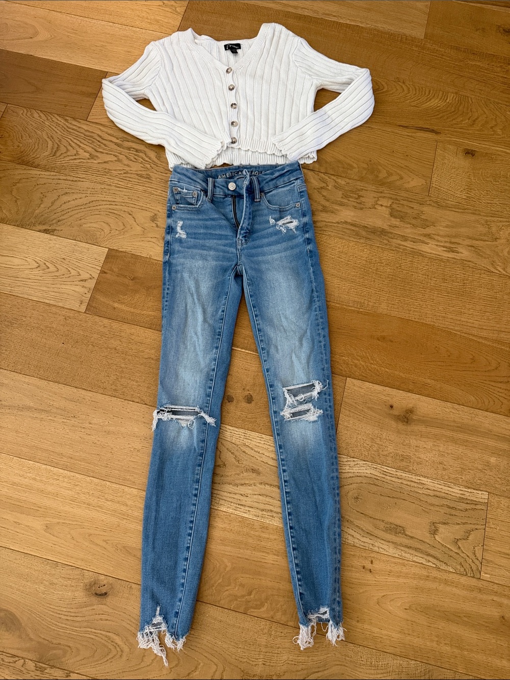 American Eagle Outfitters Skinny Jeans Paired with Button Down Sweater